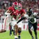 Alabama Crimson Tide running back Jase McClellan (2) carries the ball against the Vanderbilt Commodores during the second half at Bryant-Denny Stadium.